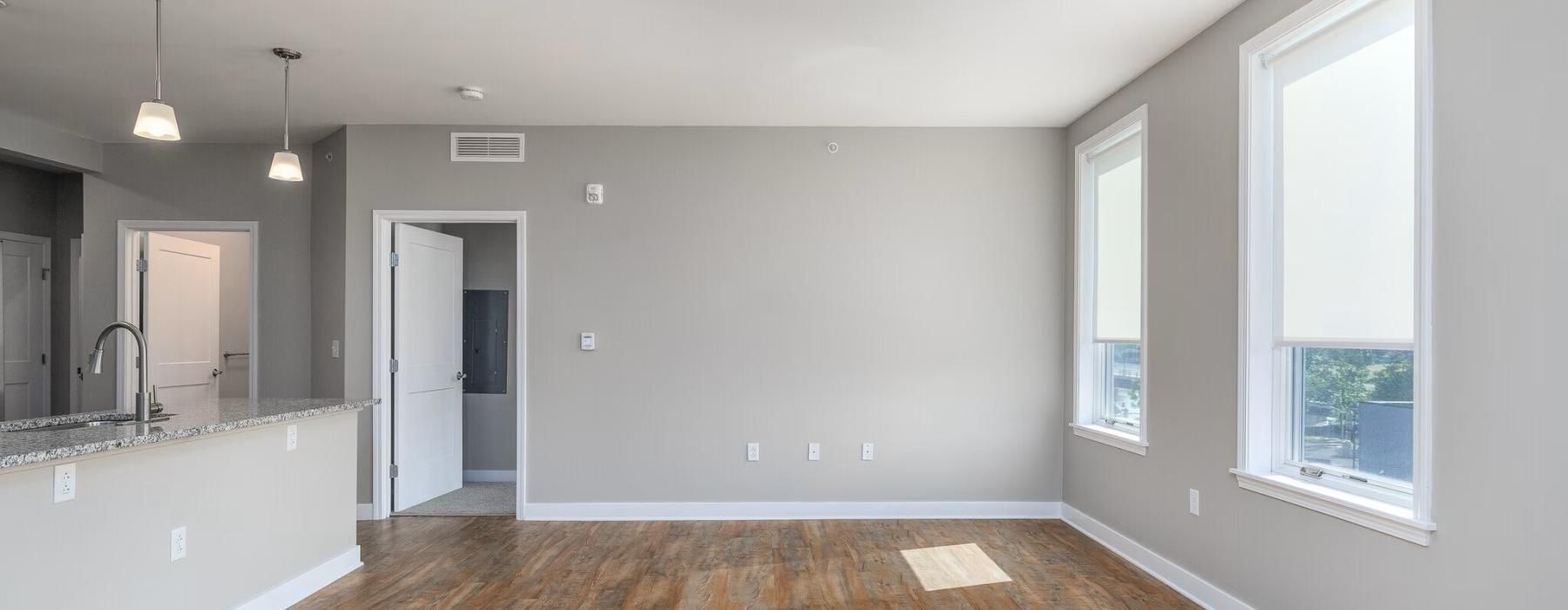 a living room with a wood floor