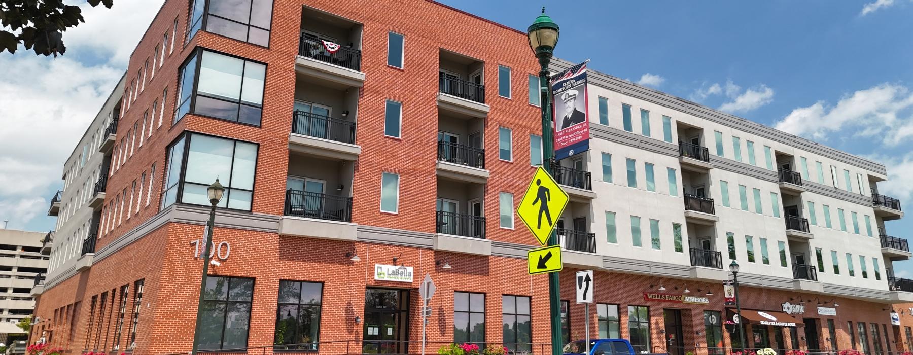 a large building with a street sign