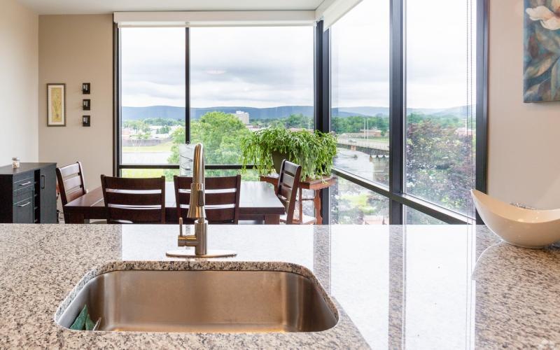 a kitchen with a large window